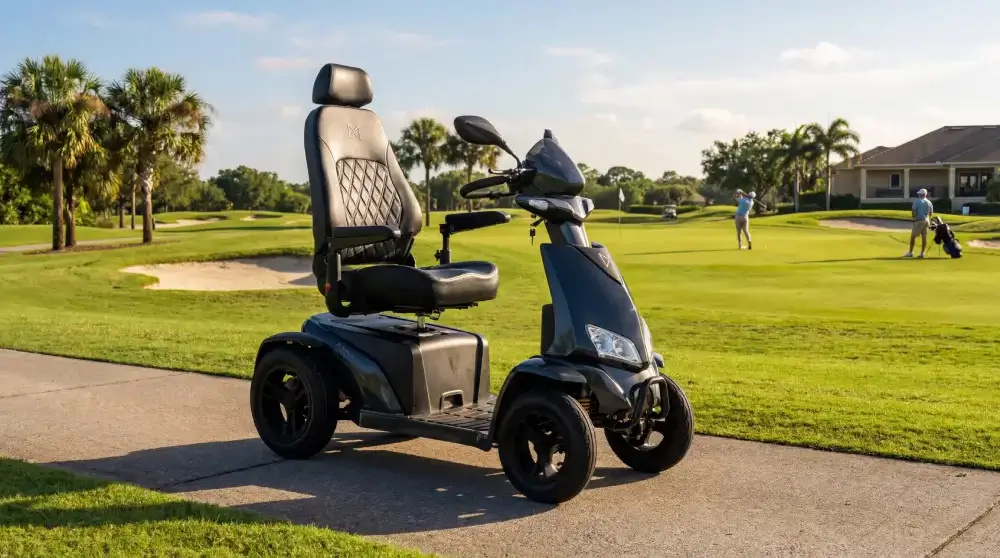 Obsidian mobility scooter with golf course in the background